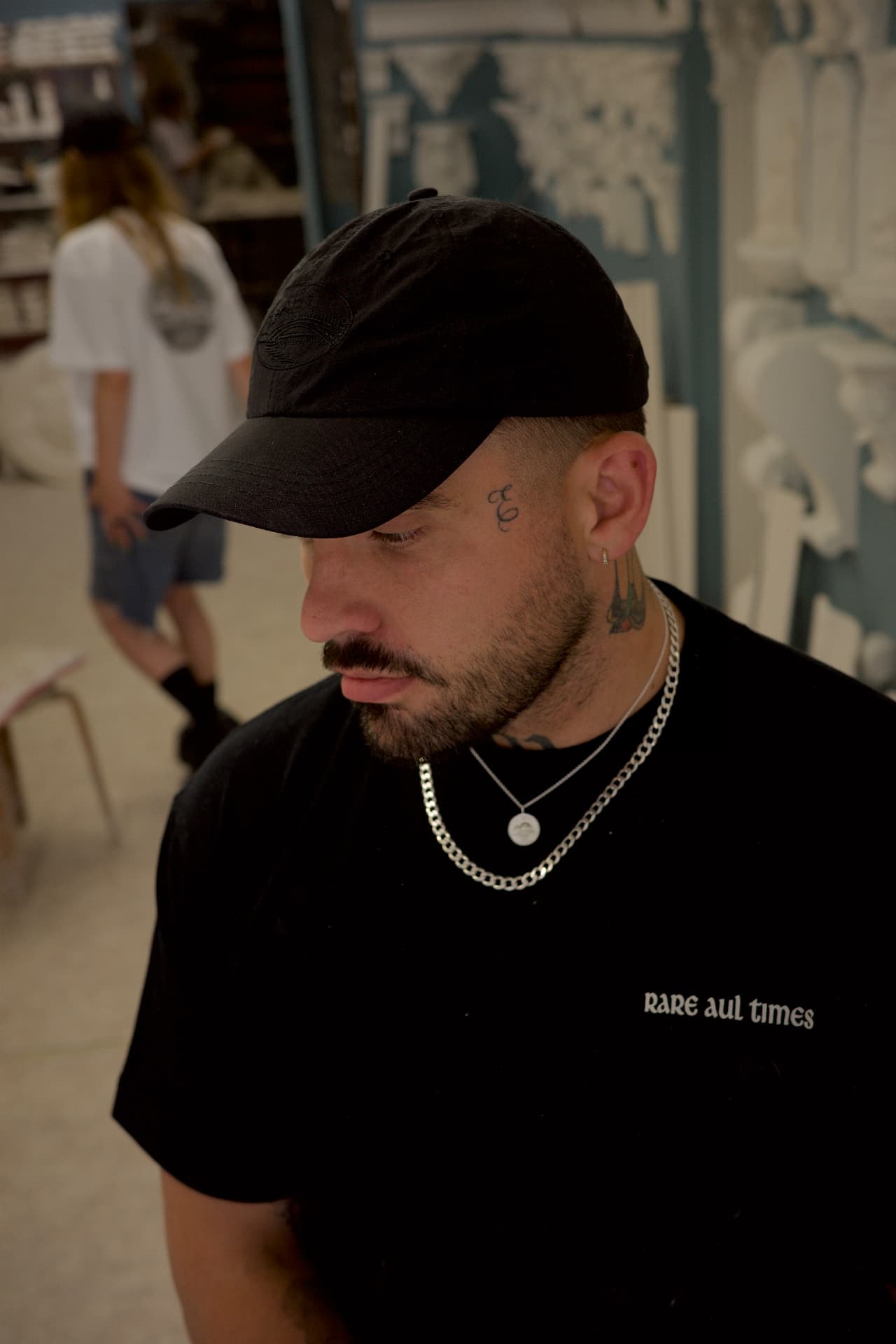 HERO logo black sports cap worn by model