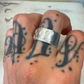 RAT sterling silver band ring worn on hand