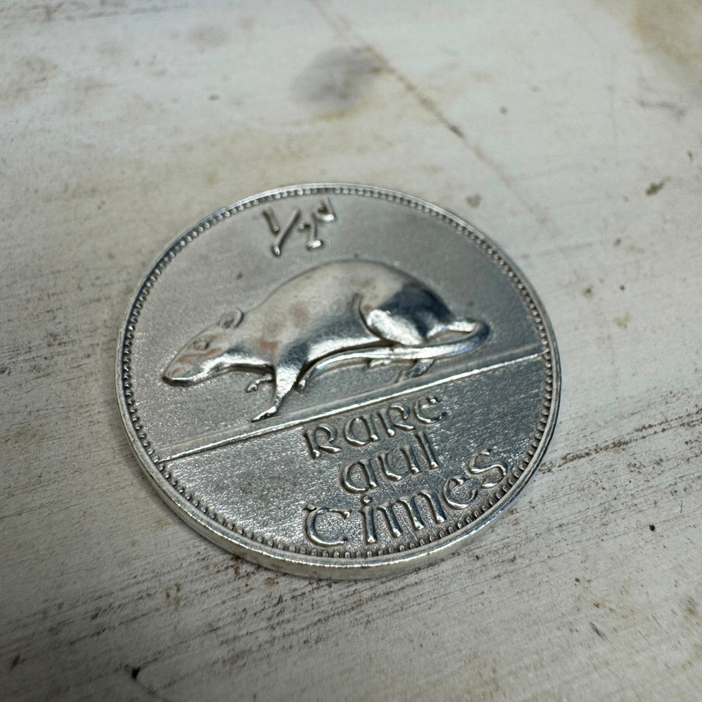 Angled view of the Rare Aul Times collectable coin