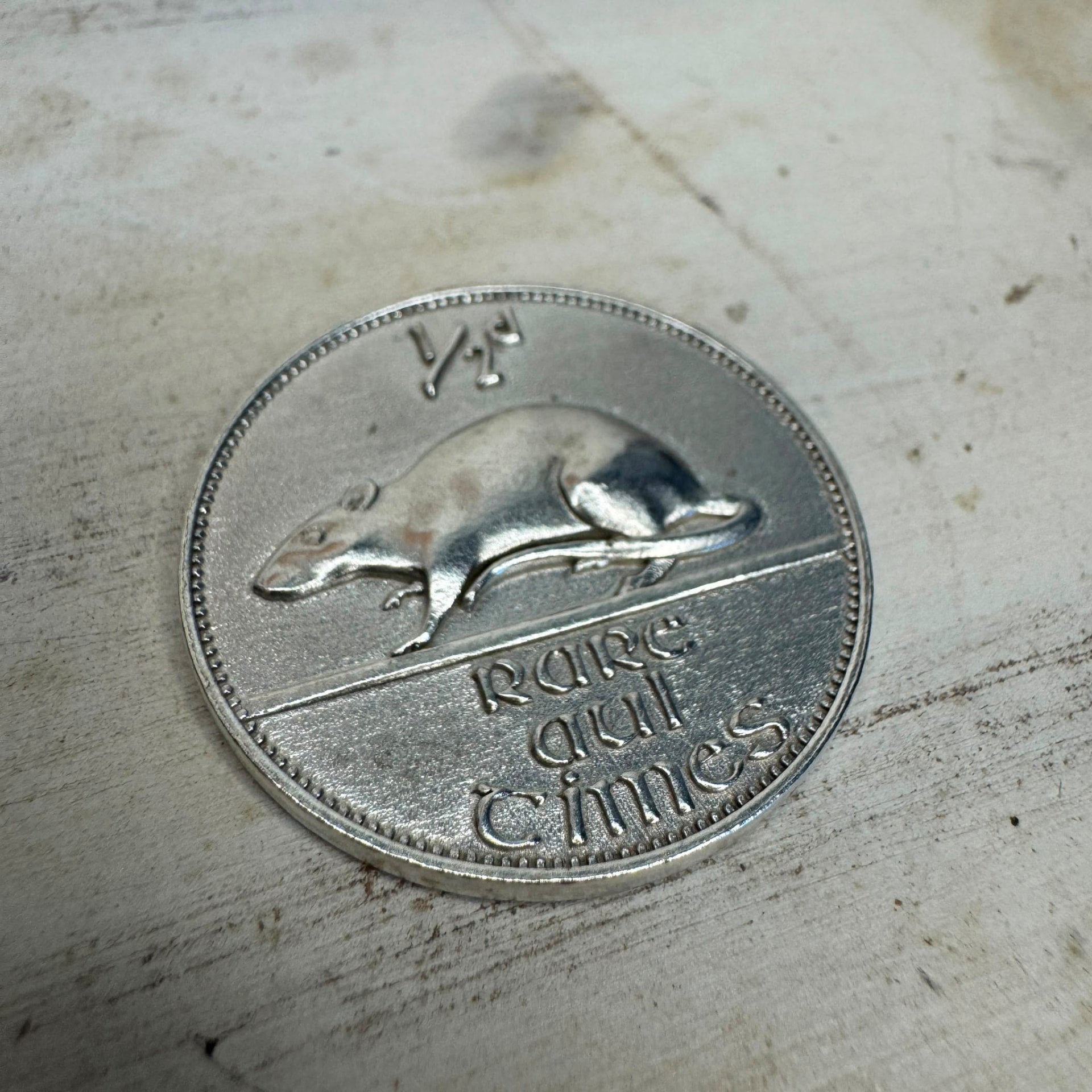 Angled view of the Rare Aul Times collectable coin